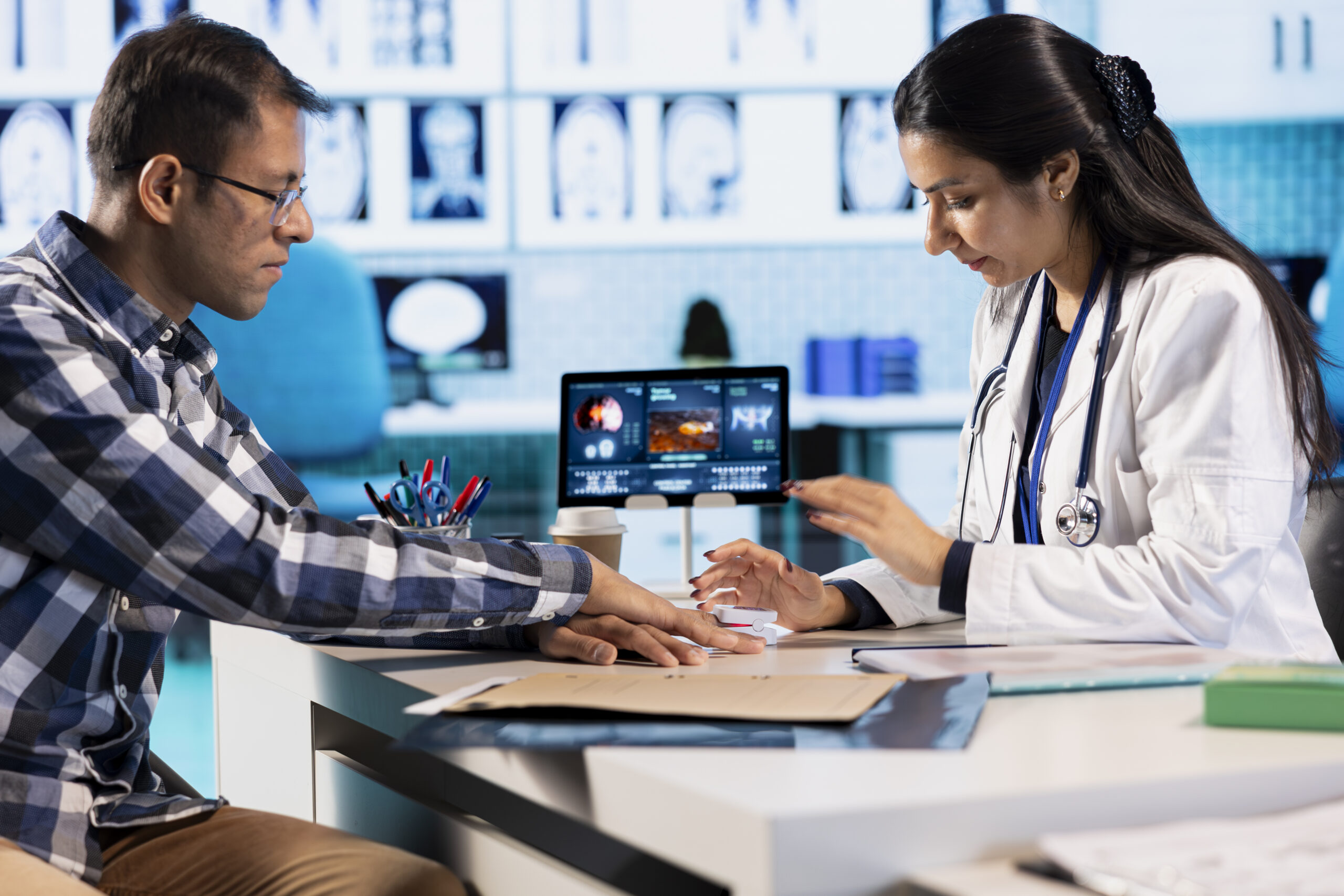 Radiology team reviewing diagnostic imaging reports